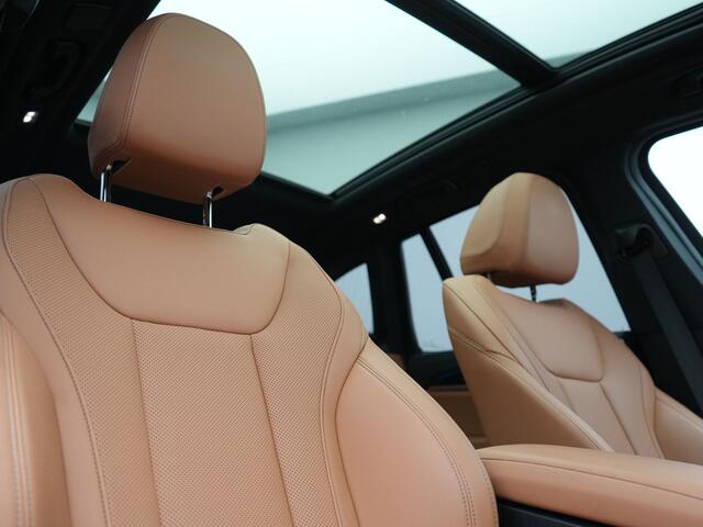 BMW iX3 M Sport 80 kWh 286pk Dealer O.H | Panodak | Adaptive Cruise | Camera | Lederen Sportstoelen Memory & Verwarmd | Sfeerverlichting | Blis | Apple Carplay | Navigatie | DAB | 19"L.M