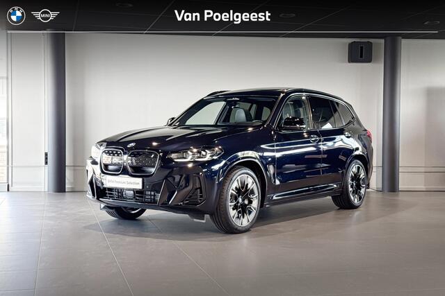 BMW iX3 High Executive Edition 80 kWh | M Sport | Glazen Panoramadak | Stoelverwarming | Head-Up Display | Trekhaak |