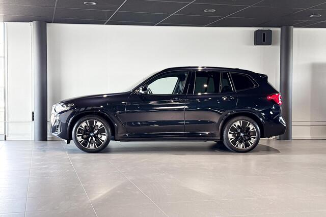 BMW iX3 High Executive Edition 80 kWh | M Sport | Glazen Panoramadak | Stoelverwarming | Head-Up Display | Trekhaak |