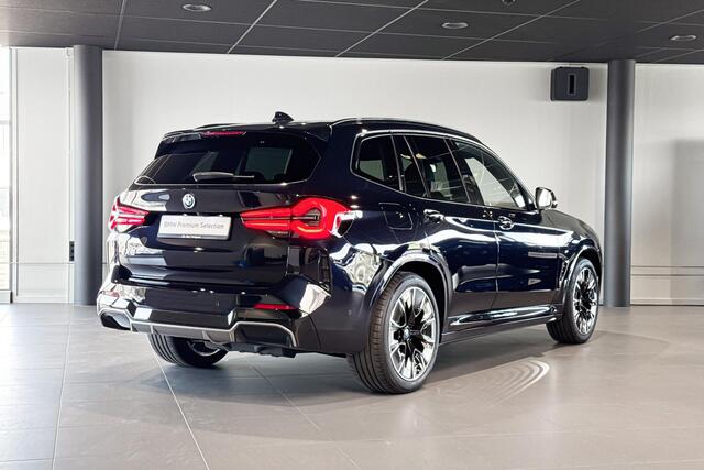 BMW iX3 High Executive Edition 80 kWh | M Sport | Glazen Panoramadak | Stoelverwarming | Head-Up Display | Trekhaak |