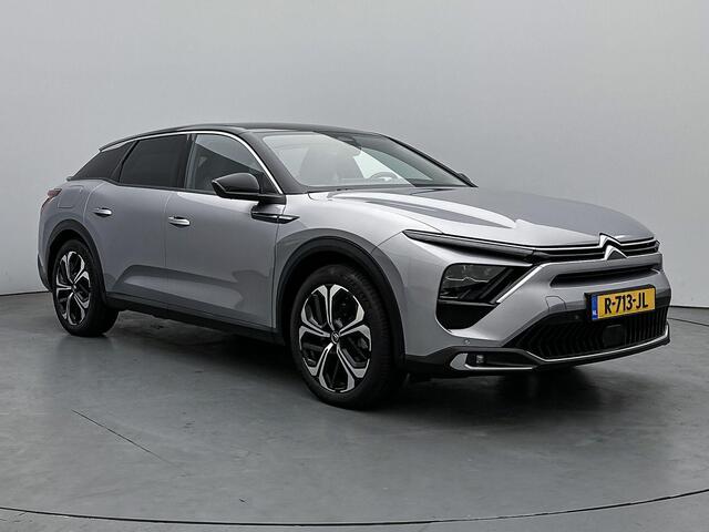Citroen C5 X Business Plus Hybrid 225 pk Automaat | Navigatie | Achteruitrijcamera | Parkeersensoren Voor en Achter | Verwarmde Comfortstoelen | LED Koplampen | Keyless Entry/Start | Verwarmd Lederen Stuurwiel | Trekhaak | Adaptieve Cruise Control | 19" Lichtmetalen