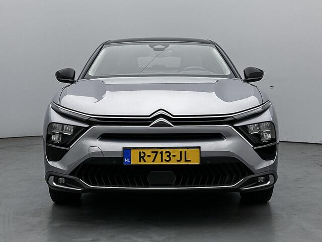 Citroen C5 X Business Plus Hybrid 225 pk Automaat | Navigatie | Achteruitrijcamera | Parkeersensoren Voor en Achter | Verwarmde Comfortstoelen | LED Koplampen | Keyless Entry/Start | Verwarmd Lederen Stuurwiel | Trekhaak | Adaptieve Cruise Control | 19" Lichtmetalen