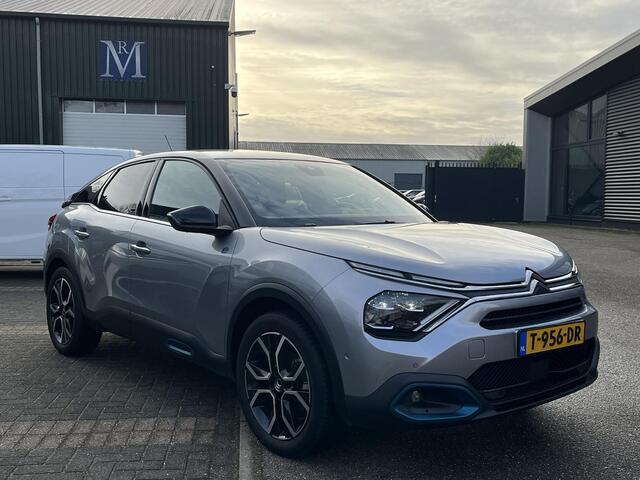 Citroen ë-C4 Shine 50 kWh SOH 98% 3-FASE LADER | VAN: ¤19.900 VOOR: ¤17.877- UW EINDEJAARSVOORDEEL: ¤2.023| stuur + stoel verwarming | trekhaak | head-up display | Camera | keyles start & go | dodehoek | Rijklaar geleverd met 12 maanden BOVAG-garantie