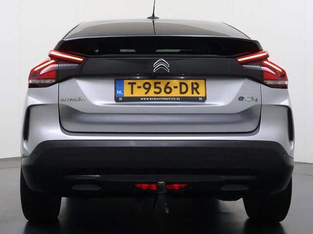 Citroen ë-C4 Shine 50 kWh SOH 98% 3-FASE LADER | STUUR- & STOELVERWARMING | TREKHAAK | HEAD-UP DISPLAY | CAMERA | KEYLESS START & GO | DODEHOEKDETECTIE | RIJKLAAR MET 12 MAANDEN BOVAG-GARANTIE