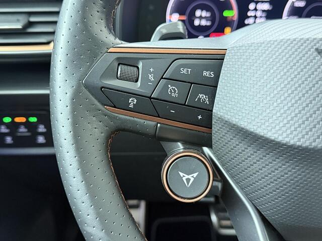 Cupra Leon 1.4 e-Hybrid VZ Business | 245 PK | SoH 86% | Adaptive Cruise Control | Achteruitrijcamera | Climate control | Dodehoek detectie | Keyless Entry | LED verlichting | Navigatiesysteem | Draadloze telefoonlader | Sfeerverlichting | Stuur- & Stoelverwarming | Parkeersensoren | Apple Carplay / Android Auto |