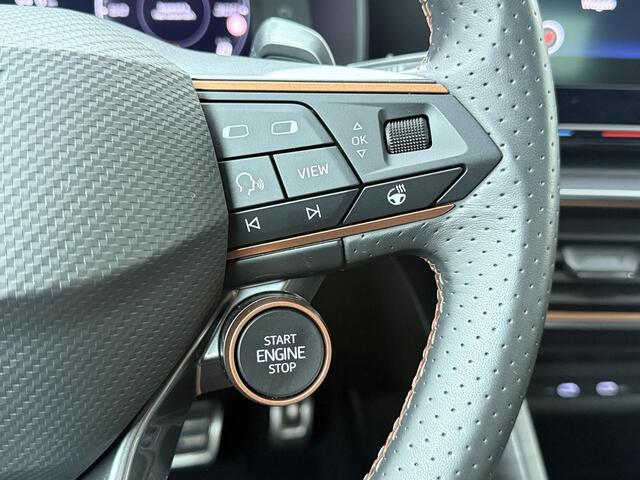 Cupra Leon 1.4 e-Hybrid VZ Business | 245 PK | SoH 86% | Adaptive Cruise Control | Achteruitrijcamera | Climate control | Dodehoek detectie | Keyless Entry | LED verlichting | Navigatiesysteem | Draadloze telefoonlader | Sfeerverlichting | Stuur- & Stoelverwarming | Parkeersensoren | Apple Carplay / Android Auto |