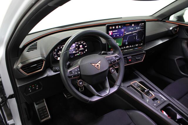 Cupra Leon Sportstourer 1.5 TSI e-Hybrid Business PHEV / Stoel + Stuurverwarming / Elektr. Klep / 18" LMV / Camera / Navi /