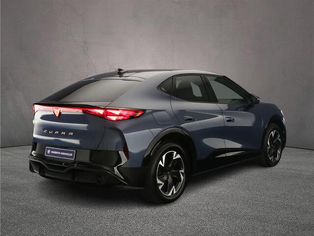 Cupra Tavascan Business 286pk Automaat Warmtepomp, Adaptive cruise control, Achteruitrijcamera, Elektrische achterklep, LED koplampen, Navigatie, Stuurwiel verwarmd