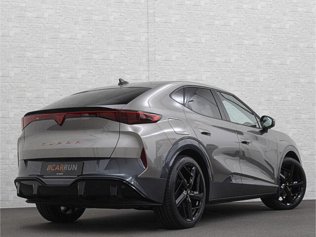 Cupra Tavascan 77 kWh | Nieuw! | Winter-Pack | Warmtepomp | Verlengde Fabrieksgarantie | 7x Op Voorraad | Adaptive Cruise Control | 3-Zone Clima | Verwarmde Voorruit | Keyless-Entry | Sfeerverlichting | Stoelverwarming | Carplay | Stuurverwarming | Getint Glas | 19 inch | Lane-Assist | Camera | Draadloos Laden |