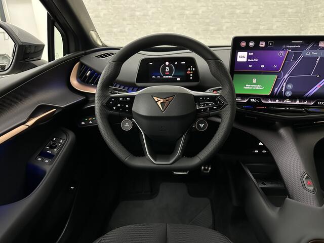 Cupra Tavascan 77 kWh | Nieuw! | Winter-Pack | Warmtepomp | Verlengde Fabrieksgarantie | 7x Op Voorraad | Adaptive Cruise Control | 3-Zone Clima | Verwarmde Voorruit | Keyless-Entry | Sfeerverlichting | Stoelverwarming | Carplay | Stuurverwarming | Getint Glas | 19 inch | Lane-Assist | Camera | Draadloos Laden |