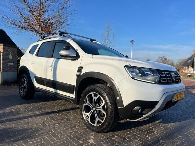 Dacia DUSTER 1.6 SCe Prestige | Uniek | Grijs Kenteken | 4X4 | Camera | Trekhaak | Stoelverwarming |
