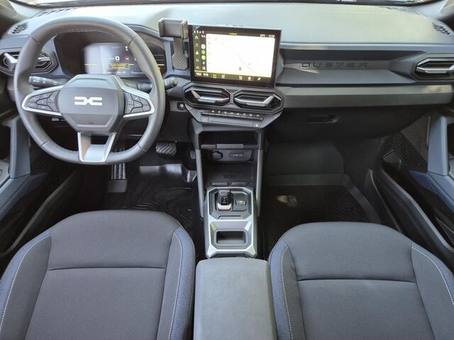 Dacia DUSTER 1.6 Hybrid 140 Journey Automaat / Pack winter / Navigatie via Apple Carplay of Android Auto / Stuur- en Stoelverwarming / Cruise control / Achteruitrijcamera / Draadloze telefoon lader / Climate control /