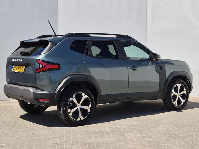 Dacia DUSTER 1.6 Hybrid 140 Journey Automaat / Pack winter / Navigatie via Apple Carplay of Android Auto / Stuur- en Stoelverwarming / Cruise control / Achteruitrijcamera / Draadloze telefoon lader / Climate control /