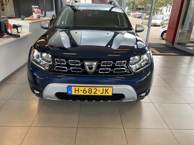 Dacia DUSTER 1.3 TCe Prestige,4WD,Trehaak,Navigatie,Rondomzichtcamera,Keyless,Parkeersensoren V&A,Spraakbediening,Airco,Cruisecontrol,Treeplankset,17 Inch Lmv