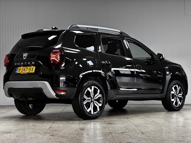 Dacia DUSTER 1.0 TCe Bi-Fuel LPG! Prestige/ DEALER ONDERHOUDEN!/ 17'' LMV/ Camera/ Extra getint glas/ LED Koplampen/ Apple + Android/ Dode-Hoek Ass./ DAB+/ Navi/ Clima/ Cruise/ Multi. LEDER. Stuur/ Mistl./ PDC.