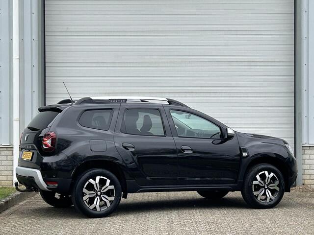 Dacia DUSTER 1.3 TCe Prestige / Trekhaak (1500KG) / Achteruitrijcamera / Climate Control / Navigatie / Dealer Onderhouden / 1e Eigenaar / Apple Carplay & Android Auto / Dode Hoek Detectie /