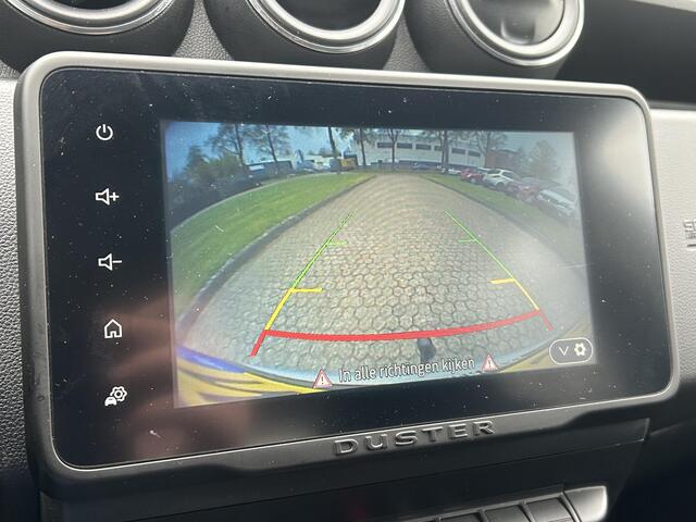 Dacia DUSTER 1.3 TCe Prestige / Trekhaak (1500KG) / Achteruitrijcamera / Climate Control / Navigatie / Dealer Onderhouden / 1e Eigenaar / Apple Carplay & Android Auto / Dode Hoek Detectie /