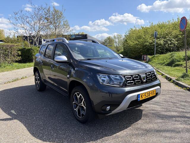 Dacia DUSTER 1.3 TCe Prestige APPLE CARPLAY ANDROID AUTO / AIRCO / PARKEERSENSOREN+CAMERA / NAVIGATIE.