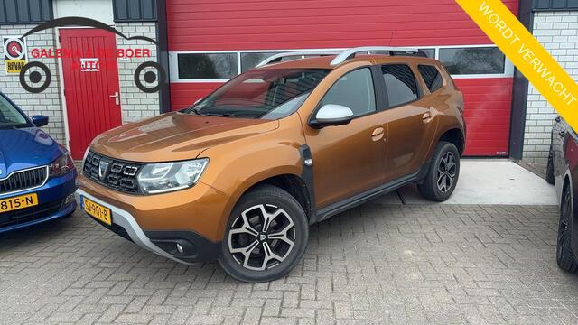 Dacia DUSTER 1.2 TCe Prestige 1STE EIG / TREKHAAK / KEYLESS / 360GR CAMERA / NAVI / CLIMA / PDC / BLUETOOTH / CRUISE / DAB+ / NL-AUTO