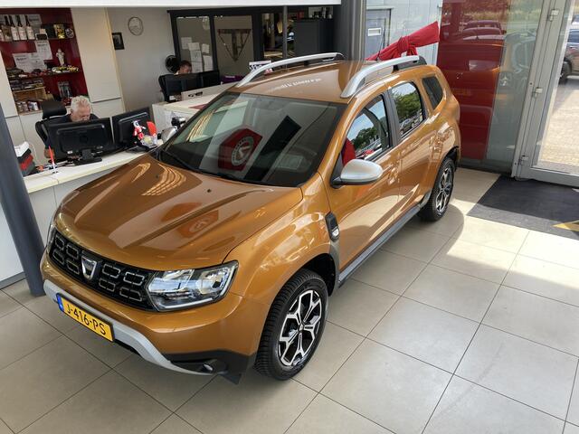 Dacia DUSTER 1.0 TCe Prestige,2E Eigenaar,Dealeronderhouden,Navigatie,Achteruitrijcamera,Bluetooth,Spraakbediening,DAB,Airco,Cruisecontrol,Trekhaak,V&A Sensoren,Dakrail,17 Inch Lmv