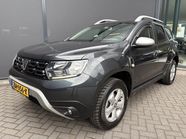 Dacia DUSTER 1.2 TCe Comfort Achteruitrijcamera - Airco - Navigatie - Trekhaak - Cruise control - Dakrails - Radio - Mistlampen voor - Start/stop systeem - Led verlichting - Elektrische ramen - Stuur multifunctioneel - Centrale vergrendeling met afstandsbediening - Bluetooth