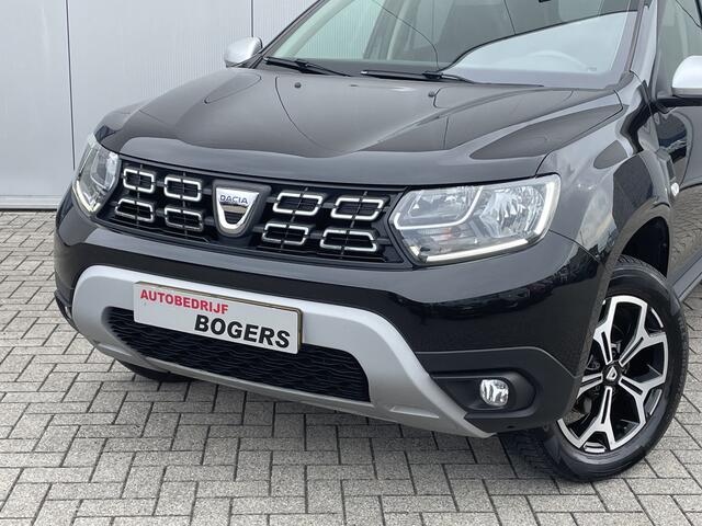 Dacia DUSTER 1.3 TCe Prestige Navigatie, Airco, 17"Lm, Leder, Stoelverwarming, Trekhaak, Cruise Control, Achteruitrijcamera
