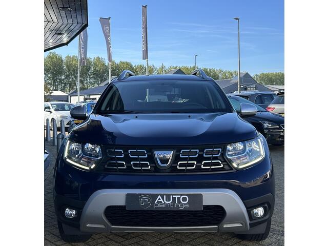Dacia DUSTER 1.3 TCe Prestige 131PK | 1e Eigenaar! | NL AUTO | NAP | Achteruitrijcamera | Navigatie | Carplay | Airco | Cruise Control | DAB+ | 17 Inch Lichtmetalen Velgen | 2 Sleutels |