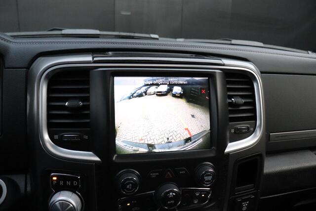 Dodge 1500 Ram 5.7 V8 Quad Cab 6'4 LAGE BIJTELLING !!! | LIMITED | LEDER | SCHUIFDAK | TREKHAAK | MEMORY | STOEL/STUURVERW. | ALPINE | STOELVERK. | CRUISE | NAVI | RAM BOX