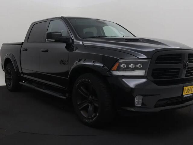 Dodge 1500 Ram 5.7 V8 4x4 Quad Cab 6'4 Sport 1500 5.7 HEMI V8 4x4 Quad Cab 6'4 Sport | LPG | Schuif/kanteldak | Winterpakket 06-2018 193.725 KM