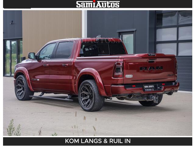 Dodge RAM PICKUP LONGHORN | WIDE BODY | 5.7 V8 | BREDE WIELEN | BOM VOL | HUD | BRUIN LEDER | LUCHTVERING | PANODAK | RONDOM CAMERA | OPEN UITLAAT KLEP | ALARM | DUBBELE CABINE | 5 PERSOONS | CREW CAB DC | SPECIAL ONE | DEALER ONDERHOUDEN | Eerste eigenaar |