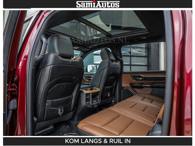 Dodge RAM PICKUP LONGHORN | WIDE BODY | 5.7 V8 | BREDE WIELEN | BOM VOL | HUD | BRUIN LEDER | LUCHTVERING | PANODAK | RONDOM CAMERA | OPEN UITLAAT KLEP | ALARM | DUBBELE CABINE | 5 PERSOONS | CREW CAB DC | SPECIAL ONE | DEALER ONDERHOUDEN | Eerste eigenaar |