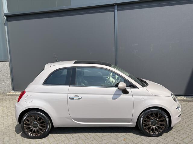 Fiat 500 1.2 Star Powder Pink Glazen panoramadak - Climate control - Parkeersensor achter - Cruise control - Mistlampen - Licht metalen velgen 16 inch - Bluetooth - Radio - Stuur multifunctioneel - Elektrische ramen - Lederen bekleding - Extra getint glas achter