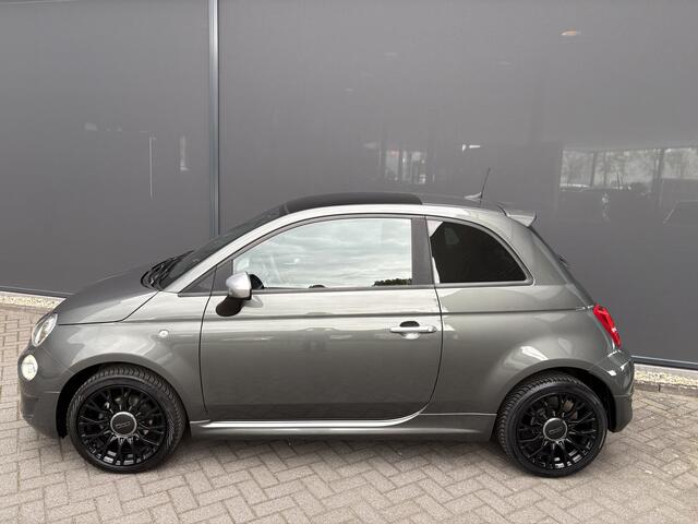 Fiat 500 1.0 Hybrid Rockstar Airco - Apple carplay - Navigatie - Parkeersensoren achter - Bluetooth - Cruise control - Glazen panoramadak - Licht metalen velgen 16 inch - Elektrische ramen - Mistlampen - Radio - Start/stop systeem - Stuur multifunctioneel - Stuur leder - Centrale vergrendeling met afstandsbediening