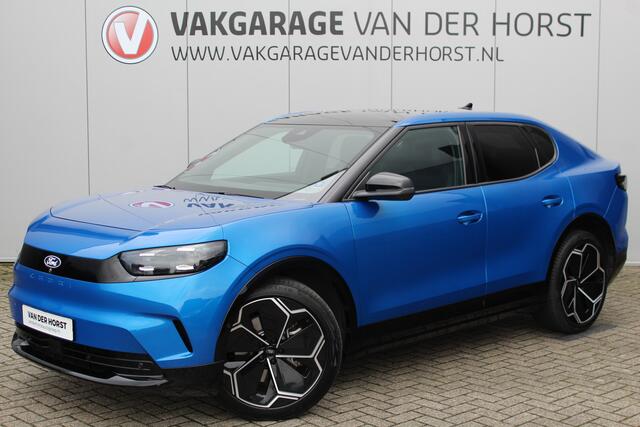 Ford CAPRI Premium Extended Range RWD 77 kWh. Fabrieksgarantie t/m 14-07-2029 ! Panoramadak, Warmtepomp, Driver Assistance Pack, 360gr. camera, Elektr. verstelbare AGR Comfortstoelen, 21" Aero LM wielen, navigatie, telefoon voorb., LED verlichting, etc, etc.