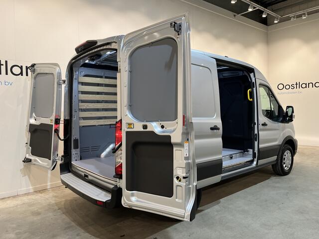Ford E-Transit 350 L2H2 Trend 68 kWh 184 PK / 100% elektrisch !! / Airco / Cruise Control / CarPlay / Camera / Navigatie / 3-Zits / 900 KM !! Z.G.A.N. !
