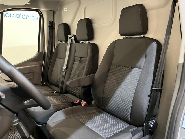 Ford E-Transit 350 L2H2 Trend 68 kWh 184 PK / 100% elektrisch !! / Airco / Cruise Control / CarPlay / Camera / Navigatie / 3-Zits / 900 KM !! Z.G.A.N. !