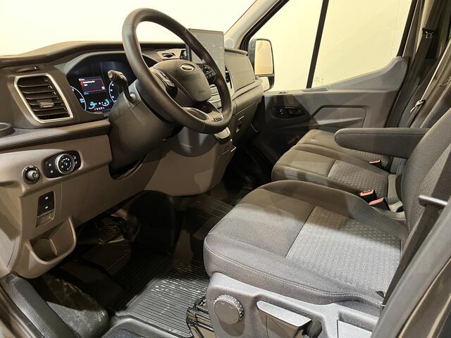 Ford E-Transit 350 L2H2 Trend 68 kWh 184 PK / 100% elektrisch !! / Airco / Cruise Control / CarPlay / Camera / Navigatie / 3-Zits / 220 KM !! Z.G.A.N. !