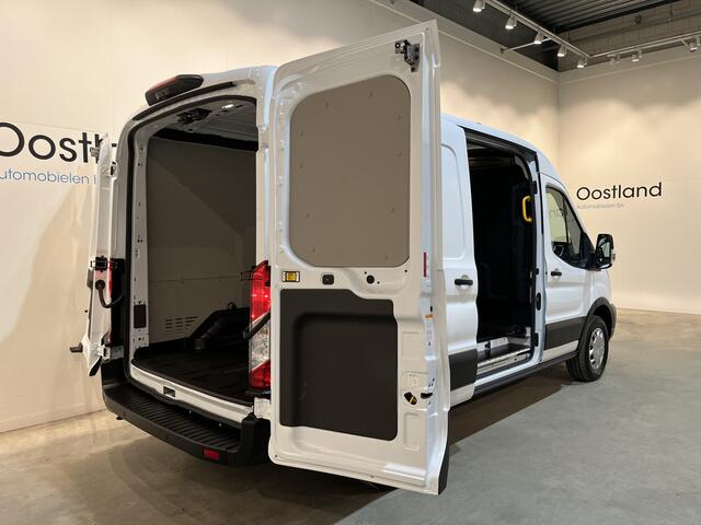 Ford E-Transit 350 L2H2 Trend 68 kWh / 100% Elektrisch !! / Airco / Cruise Control / CarPlay / Camera / Navigatie / 3-Zits / 6.600 KM !!