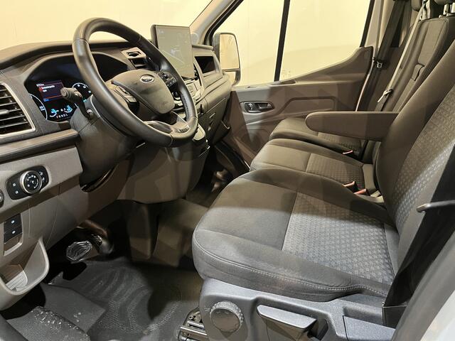 Ford E-Transit 350 L2H2 Trend 68 kWh / 100% Elektrisch !! / Airco / Cruise Control / CarPlay / Camera / Navigatie / 3-Zits / 9.500 KM !!
