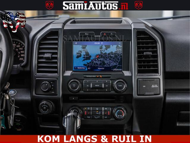 Ford F-150 5.0 V8 4X4 | MAT OLIVE GREEN | BIJTELLING VRIJ | ZEER DIK | CAMERA | 3500KG | PANORAMA | LEDER | GO RHINO ROLLBAR | CRUISE CONTROL | PRINS LPG | BAKFLIP COVER | Deze pick-up is leverbaar met zowel een groot rijbewijs (C) als een klein rijbewijs (B). Laat 