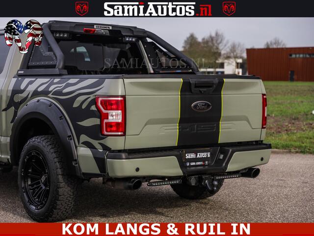 Ford F-150 5.0 V8 4X4 | MAT OLIVE GREEN | ZEER DIK | CAMERA | 3500KG | PANORAMA | LEDER | GO RHINO ROLLBAR | CRUISE CONTROL | PRINS LPG | BAKFLIP COVER | Deze pick-up is leverbaar met zowel een groot rijbewijs (C) als een klein rijbewijs (B). Laat ons weten wat jouw