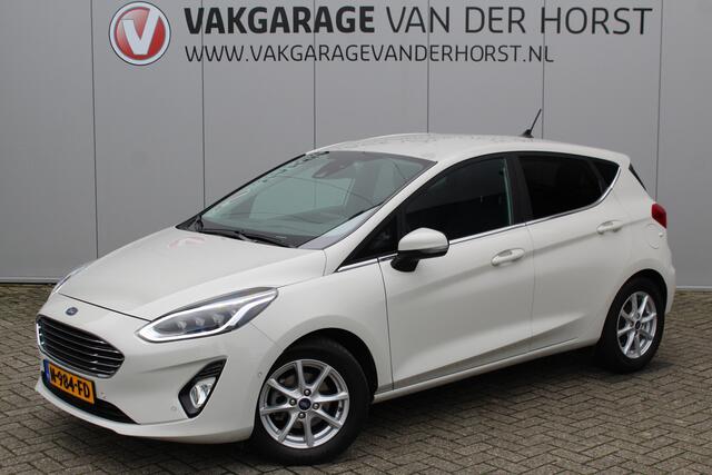 Ford FIESTA 1.0-125pk EcoBoost Mild-Hybrid Titanium. Uniek mooie en luxe Fiesta, slechts 39.000km ! Autm. airco, navigatie, telefoonvoorb., pdc v+a, B&O soundsyst., LM wielen, trekhaak, LED verlichting, adapt. cruise cntrl, side- en lane assist, metallic lak etc.