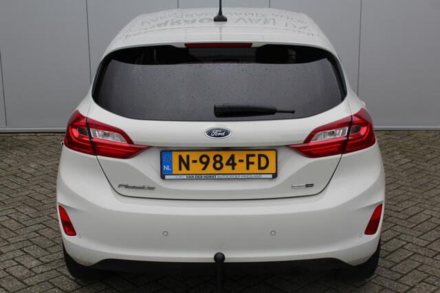 Ford FIESTA 1.0-125pk EcoBoost Mild-Hybrid Titanium. Uniek mooie en luxe Fiesta, slechts 39.000km ! Autm. airco, navigatie, telefoonvoorb., pdc v+a, B&O soundsyst., LM wielen, trekhaak, LED verlichting, adapt. cruise cntrl, side- en lane assist, metallic lak etc.