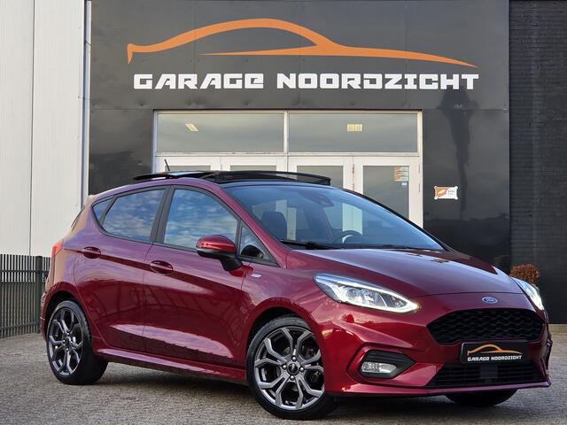 Ford FIESTA 1.0 EcoBoost ST-Line PANORAMADAK|NAVIGATIE|CRUISE CONTROL|B&O MUIZIEK|STOEL&STUUR VERWARMING|ECC/AIRCO|PDC ACHTER|17 INCH|DEALERE ONDERHOUDEN Maandag tot Vrijdag geopend van 09.00 tot 20.00 uur en Zaterdag van 09.00 tot 18.00 uur