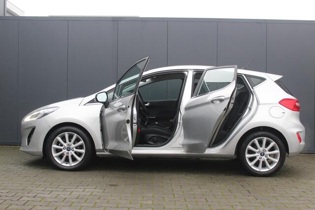 Ford FIESTA 1.0 EcoBoost Titanium | Incl. 12 maanden garantie | Cruise control | Climate control | Bluetooth | Lichtmetalen velgen | DAB+ | Navigatie | Airco