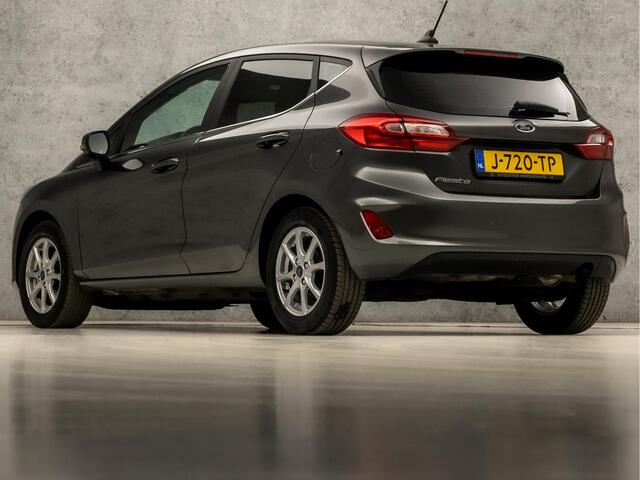Ford FIESTA 1.0 EcoBoost Titanium (APPLE CARPLAY, GROOT NAVI, CLIMATE, GETINT GLAS, PARKEERSENSOREN, SPORTSTOELEN, CRUISE, LM VELGEN, NIEUWSTAAT)