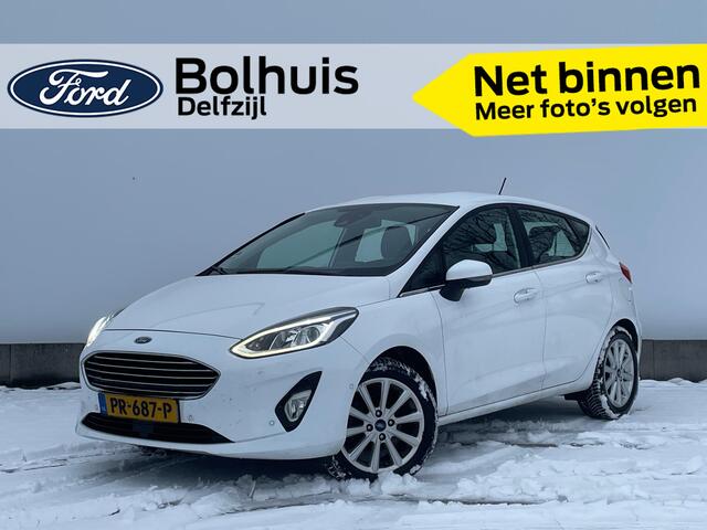 Ford FIESTA EcoBoost Titanium | Trekhaak | Adapt. Cruise | Verwarmde Voorruit | Camera | 4 seiz. banden | B&O Audio |
