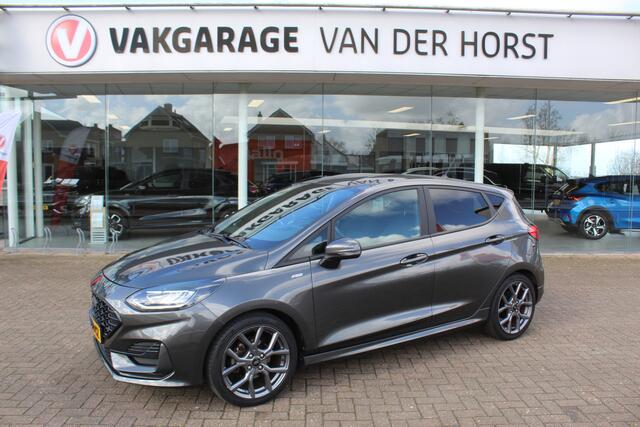 Ford FIESTA 1.0-125pk EcoBoost Mild-Hybrid ST-Line. Luxe, sportieve en goed onderhouden Fiesta ! Autm. airco, Cruise control, Lane assist, 17" Lmv, Parkeersensoren Achter, Metallic lak, Navigatie by Apple/Android, LED verlichting etc.