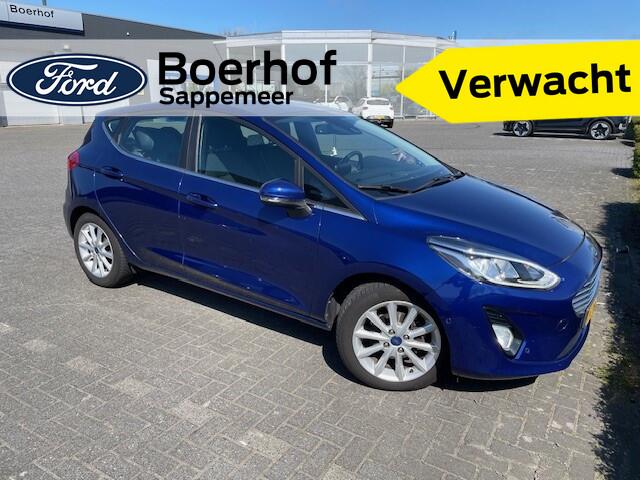 Ford FIESTA Titanium | Voorruitverw. | Clima | Auto-Park | Adap. Cruise | Camera | All season |