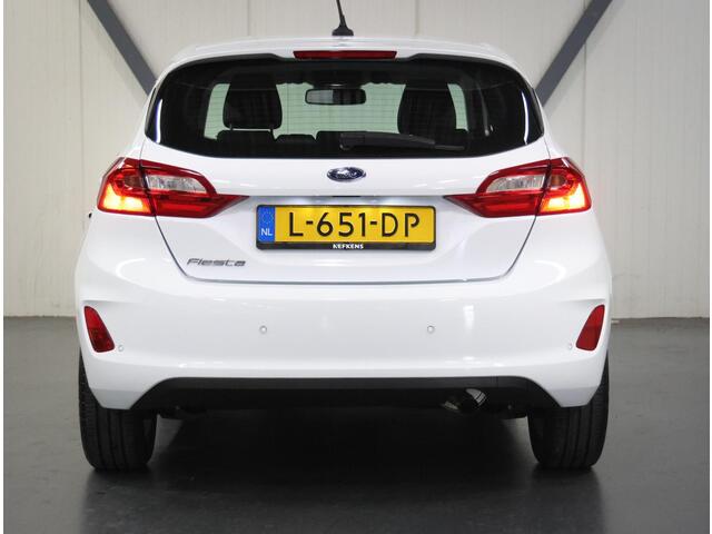 Ford FIESTA 95PK Titanium | 1ste eigenaar | Parkeersensoren | Armsteun | AppleCarPlay/AndroidAuto | LMV | Climate Control | 5 deurs | DAB Radio | Isofix |